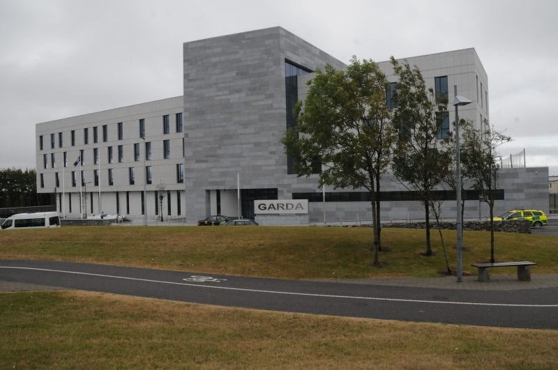 Two men charged over street fight outside Garda headquarters Two men charged over street fight outside Garda headquarters