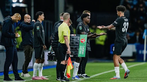 football (1) Football players making a substitution during a Carabao Cup match